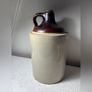 Vintage antique pottery crock jug with cork